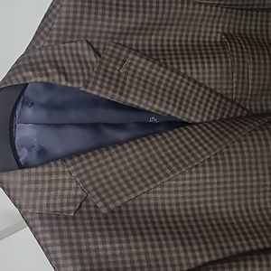 Joseph A. Bank reserve traditional fit blazer brown with blue inner lining.